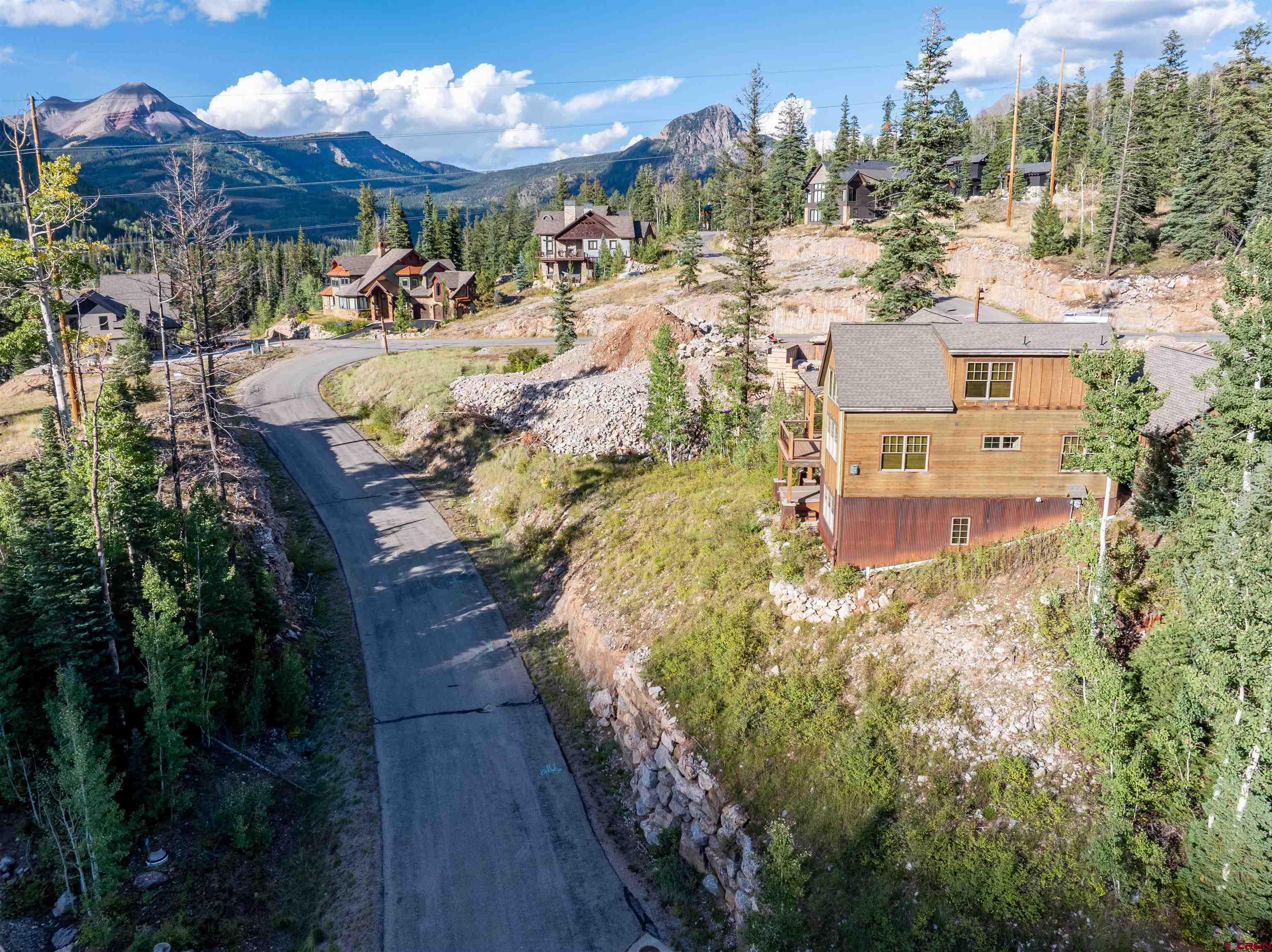 259 Engineer Drive Durango, CO 81301 - Photo 31 of 40 a view of a house with a yard and sitting area