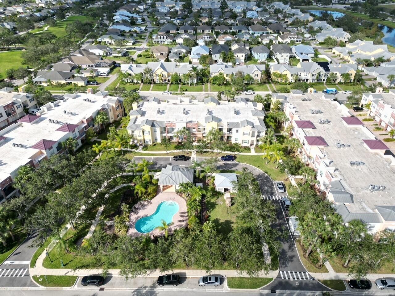 10560 Southwest Stephanie Way, Unit 1206 Port St. Lucie, FL 34987 - Photo 22 of 23 a view of outdoor space yard and lake view