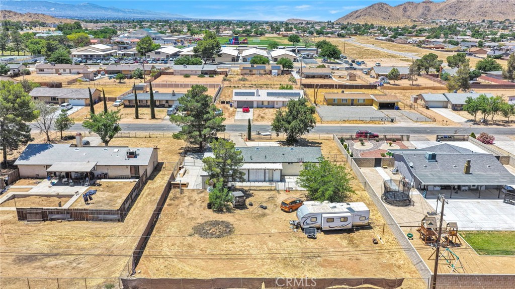 15471 Washoan Road Apple Valley, CA 92307 - Photo 36 of 38 an aerial view of residential houses with outdoor space