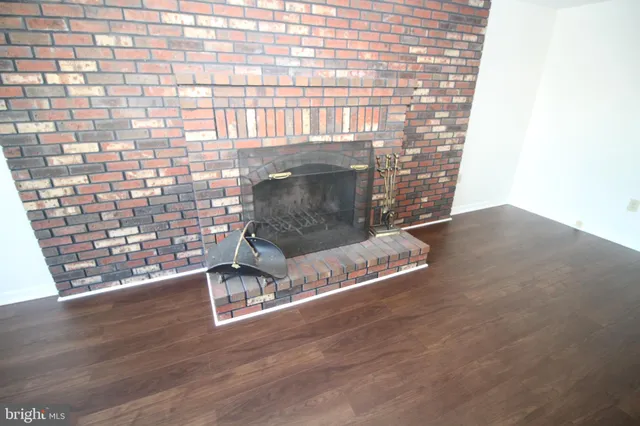 a living room with a wooden floor