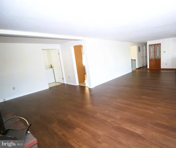 a view of livingroom with furniture and wooden floor