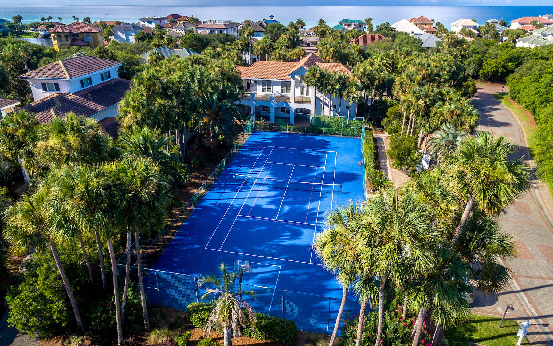 4600 Paradise Isle Destin, FL 32541 - Photo 5 of 8 an aerial view of multiple houses with yard