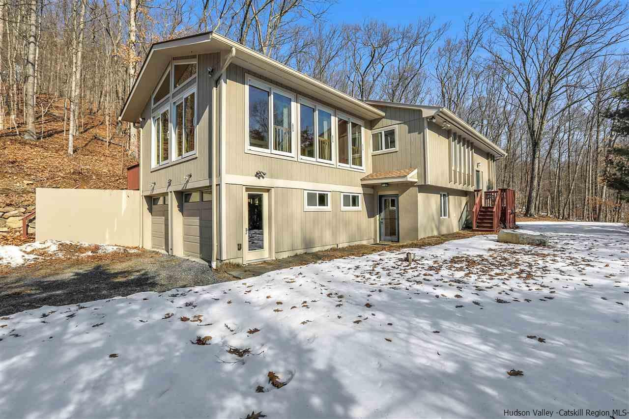 156 Sparkling Ridge Road New Paltz, NY 12561 - Photo 1 of 35 a front view of a house with a yard