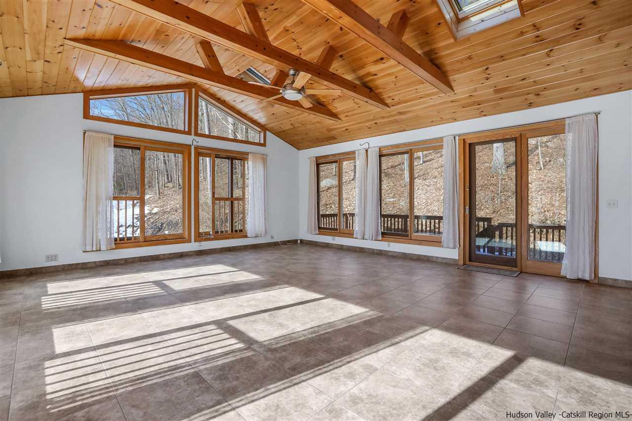 156 Sparkling Ridge Road New Paltz, NY 12561 - Photo 26 of 35 a view of an entryway with a floor to ceiling windows