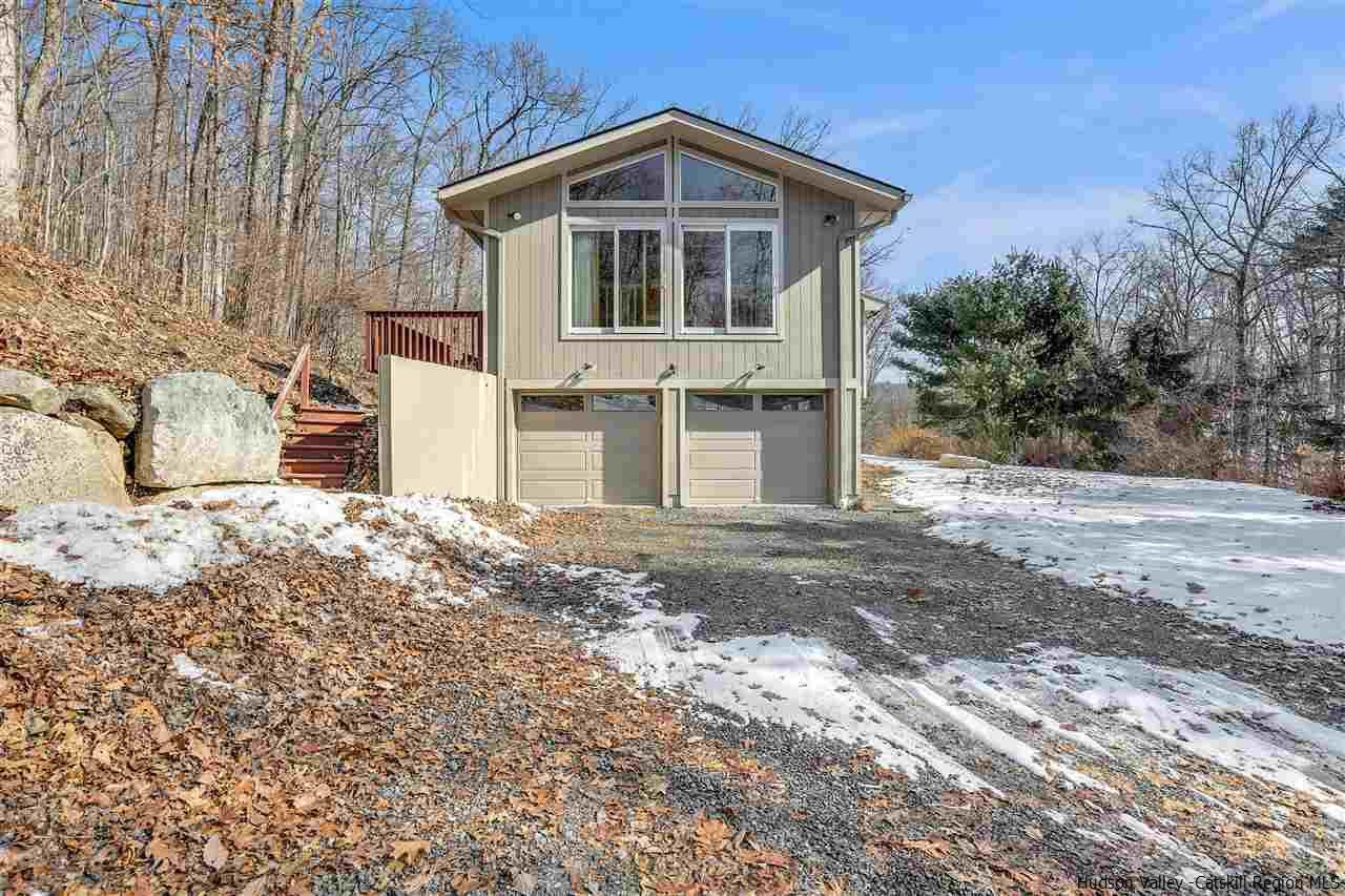 156 Sparkling Ridge Road New Paltz, NY 12561 - Photo 3 of 35 a front view of a house with a yard