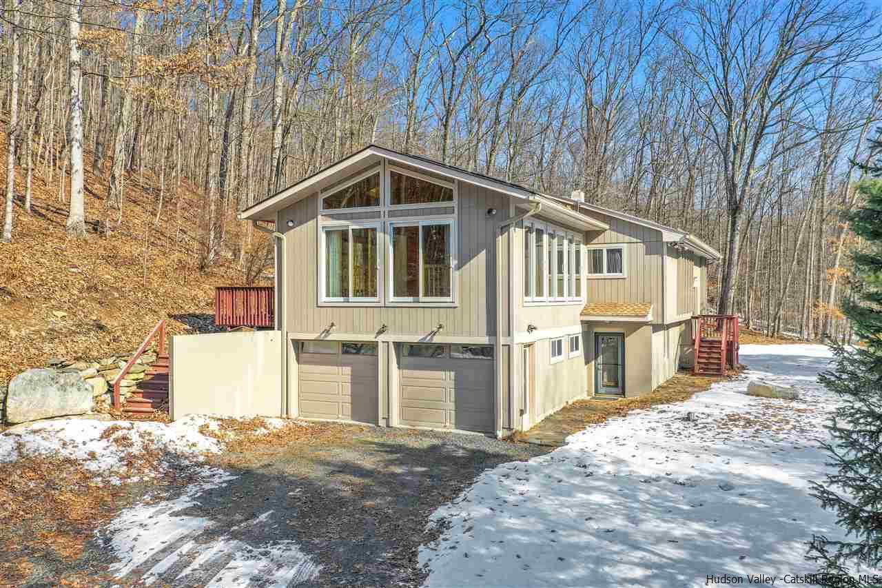 156 Sparkling Ridge Road New Paltz, NY 12561 - Photo 4 of 35 a front view of a house with a yard