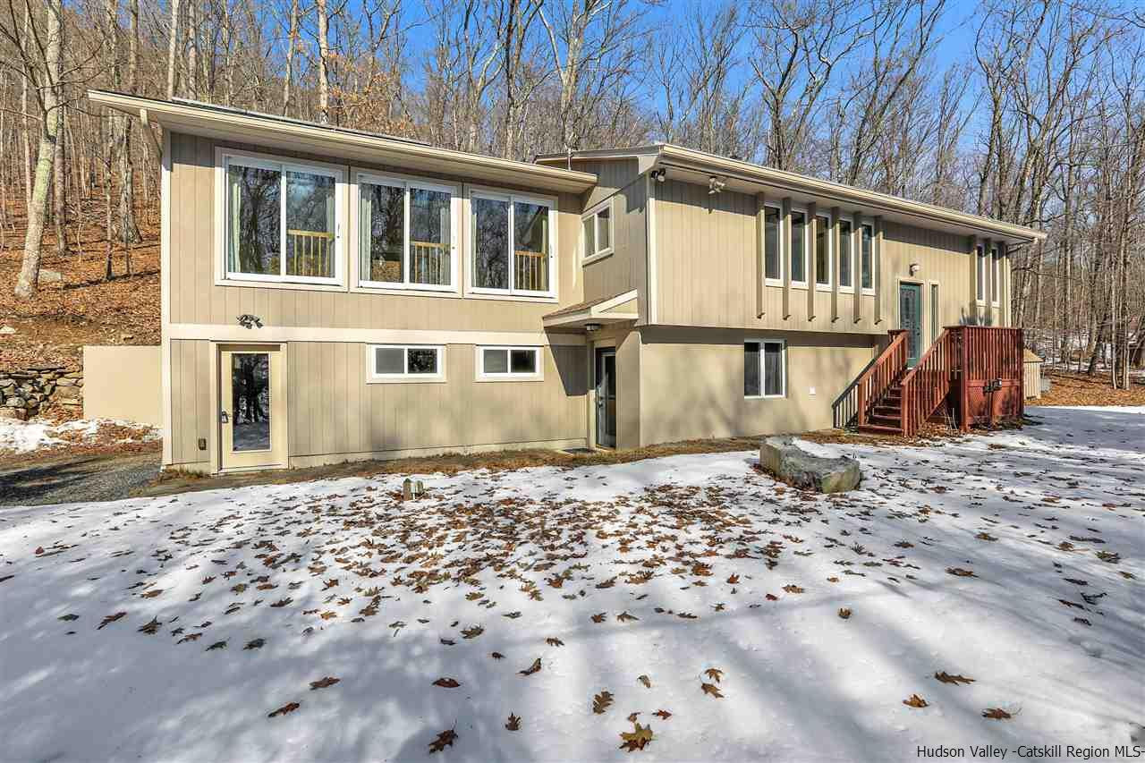156 Sparkling Ridge Road New Paltz, NY 12561 - Photo 5 of 35 a front view of a house with a yard