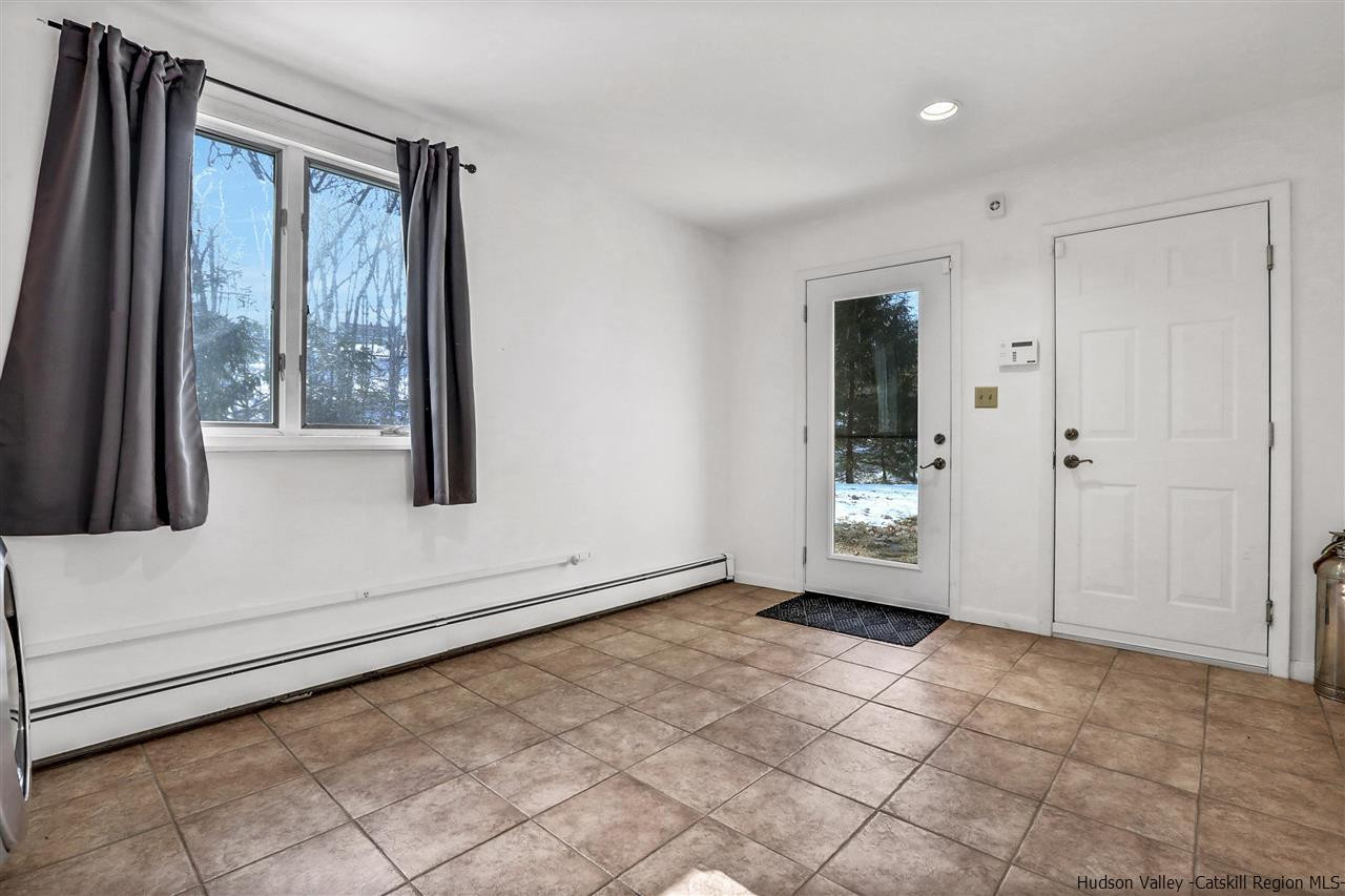 156 Sparkling Ridge Road New Paltz, NY 12561 - Photo 6 of 35 a view of an empty room and window