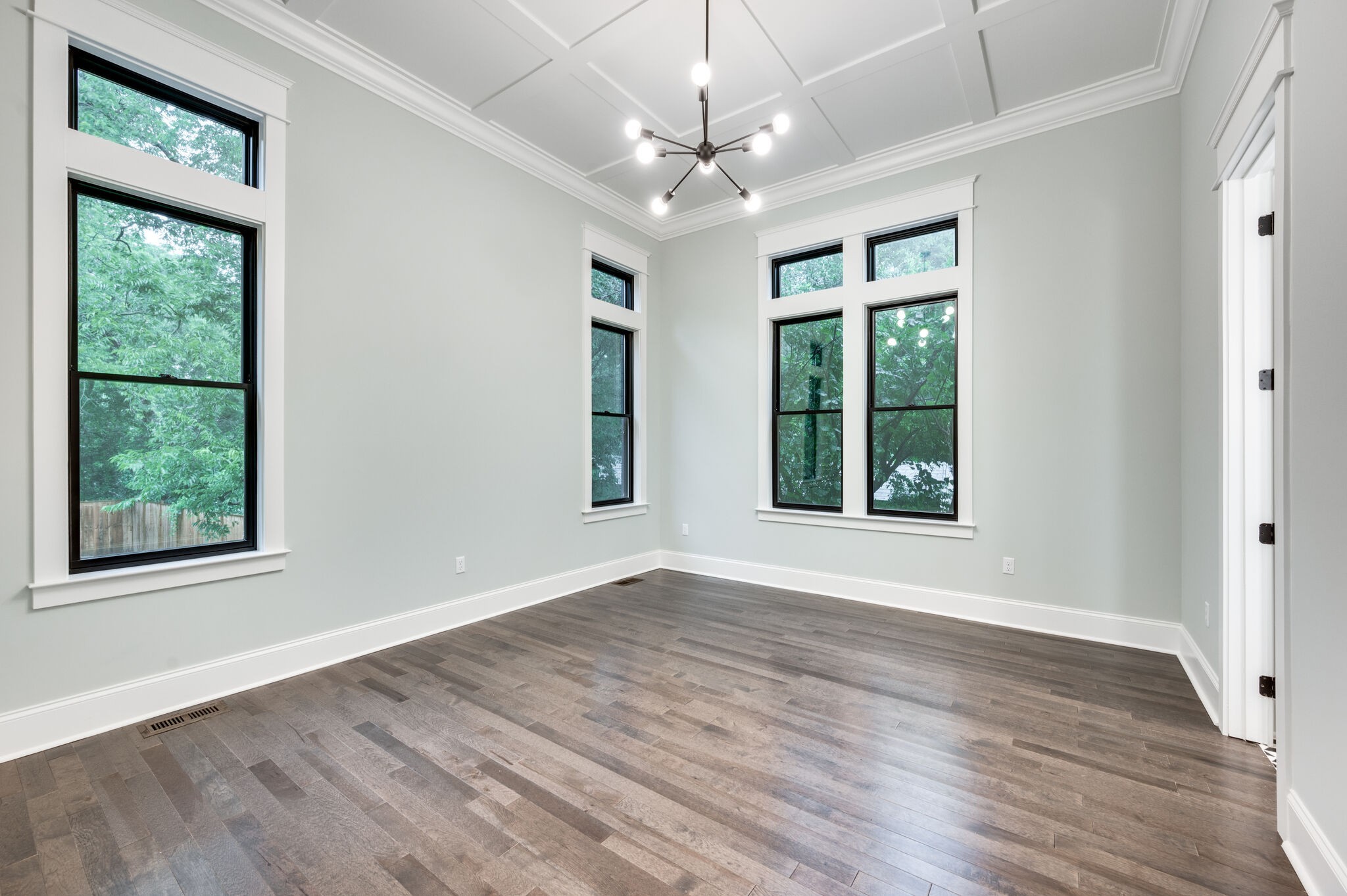 420 Lanier Drive Madison, TN 37115 - Photo 32 of 44 a view of an empty room with wooden floor and a window