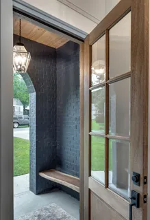 a view of room with window and entryway