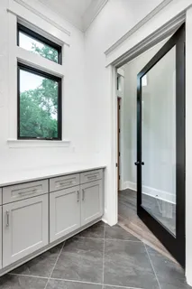 a view of a bathroom with tub and window