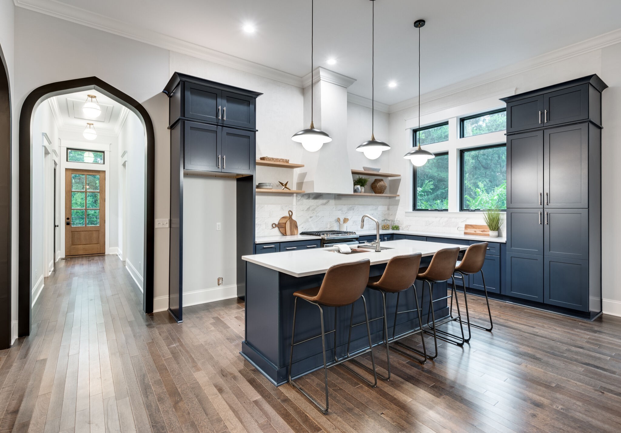 420 Lanier Drive Madison, TN 37115 - Photo 10 of 44 a kitchen with stainless steel appliances granite countertop wooden floors and sink