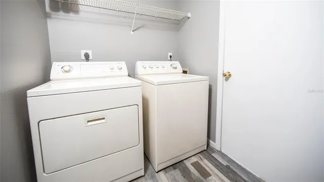 a utility room with dryer and washer