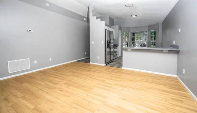 a view of a kitchen with a sink