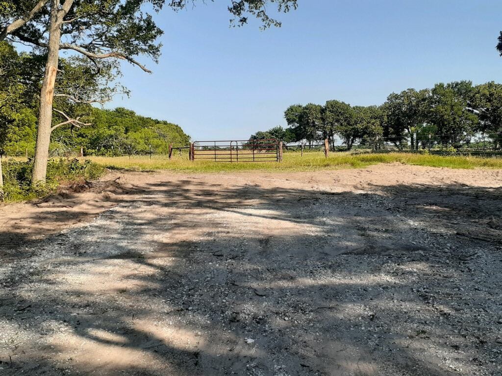 245 Rd Kosse Tx 76653 Road Kosse, TX 76653 - Photo 2 of 26 a view of a swimming pool with an outdoor seating and a yard
