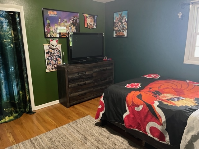 19306 East Creston Road Rochelle, IL 61068 - Photo 20 of 40 a bedroom with a bed and a flat screen tv