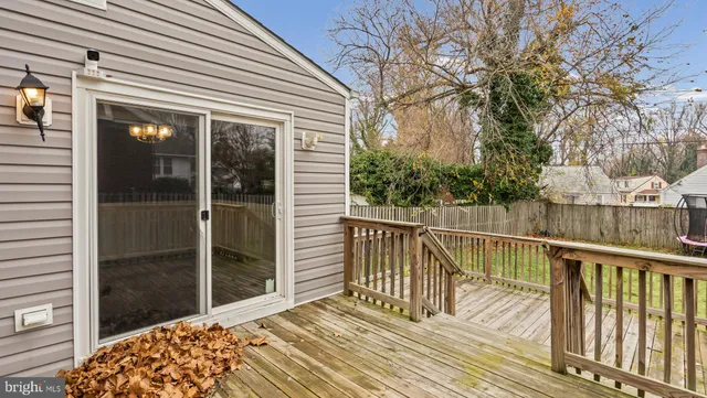 a view of balcony with wooden floor