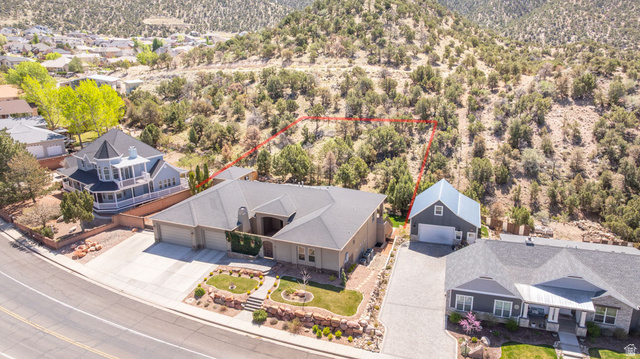 888 East Fiddlers Canyon Road Cedar City, UT 84721 - Photo 69 of 74 Aerial perspective of suburban area featuring property parcel outlined and a mountain backdrop