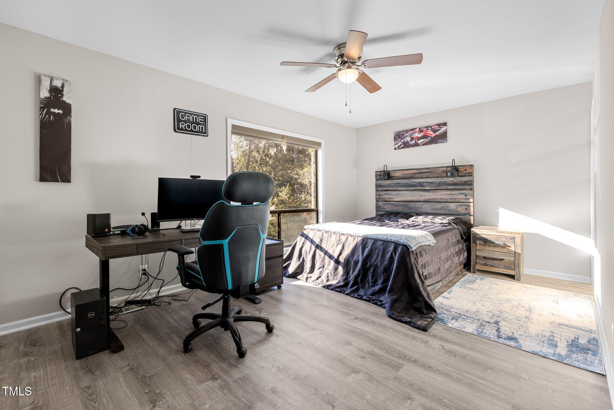 6230 Dixon Drive Raleigh, NC 27609 - Photo 23 of 32 a bedroom with a workspace