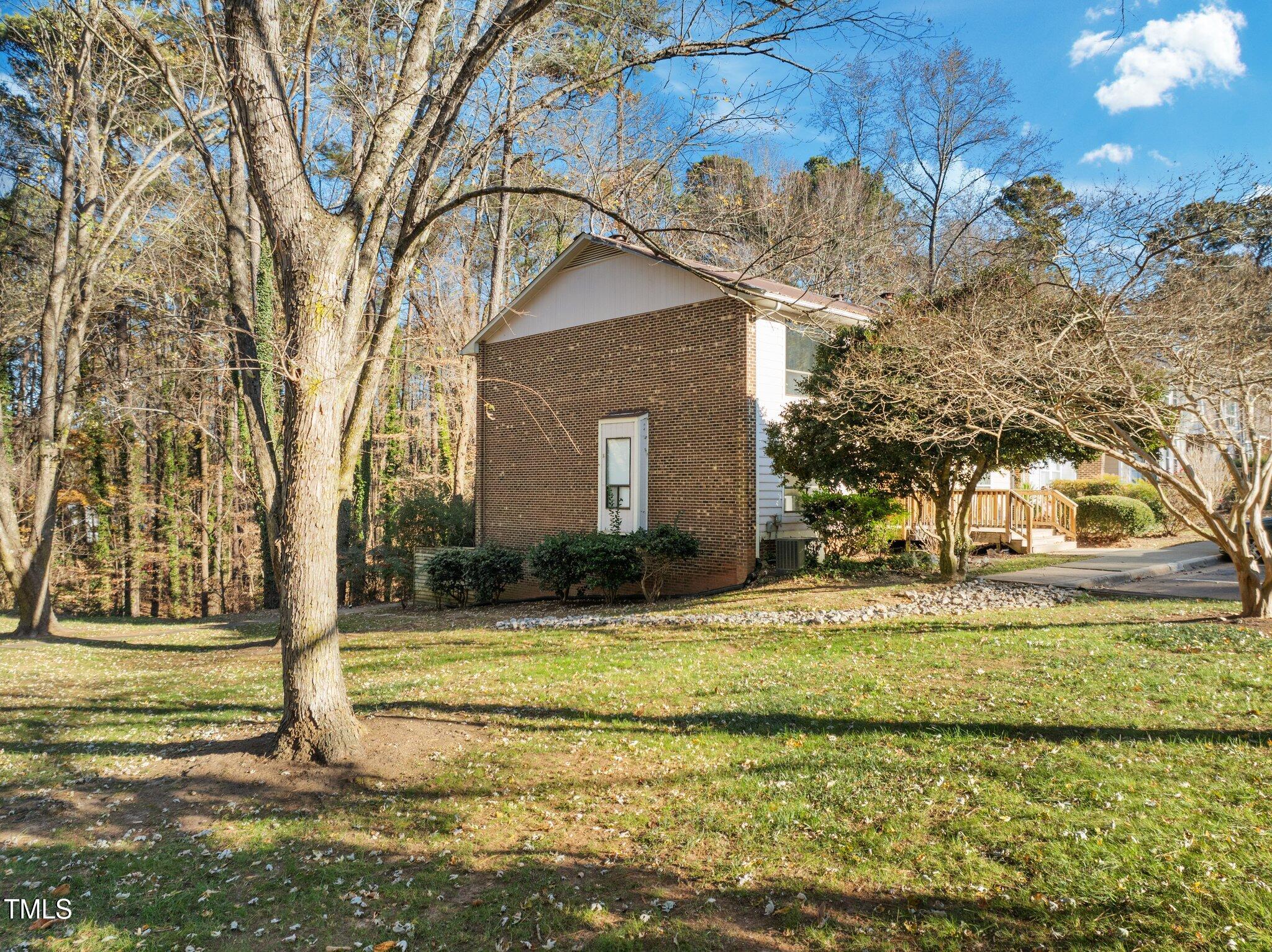 6230 Dixon Drive Raleigh, NC 27609 - Photo 28 of 32 a view of a house with a snow in the yard