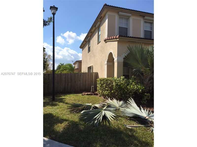 2145 Northeast 38th Road Homestead, FL 33033 - Photo 2 of 28 a view of a house with a small yard