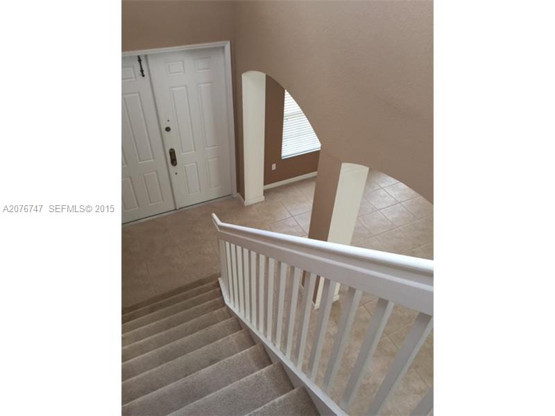 2145 Northeast 38th Road Homestead, FL 33033 - Photo 28 of 28 a view of a hallway with wooden floor