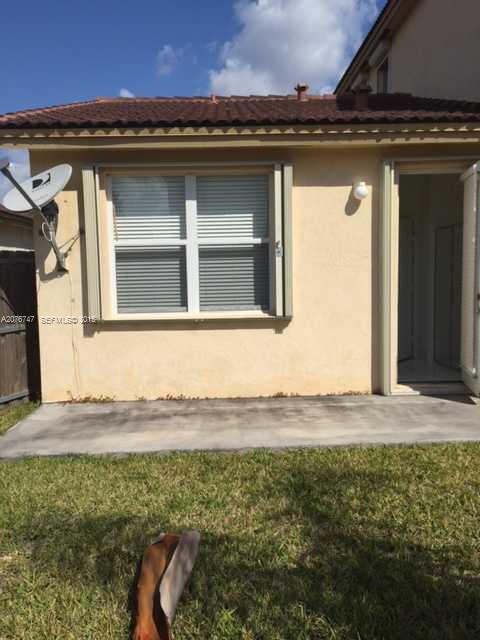 2145 Northeast 38th Road Homestead, FL 33033 - Photo 4 of 28 a front view of a house