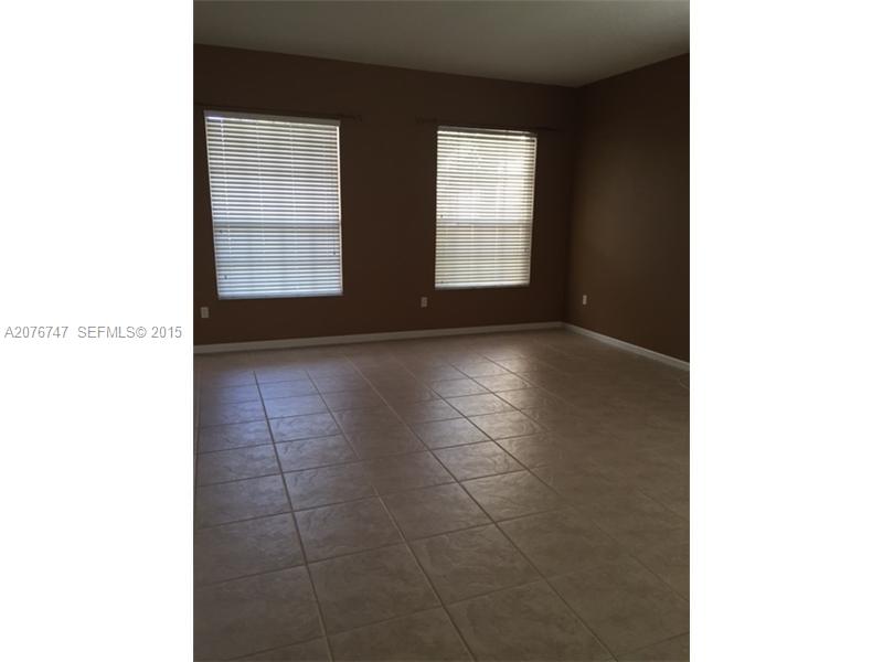 2145 Northeast 38th Road Homestead, FL 33033 - Photo 10 of 28 a view of an empty room with windows