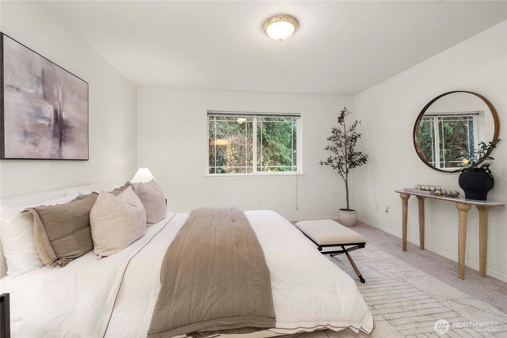 19504 Southeast 24th, Unit B Bothell, WA 98012 - Photo 17 of 34 a bed room with a bed a window and a chair