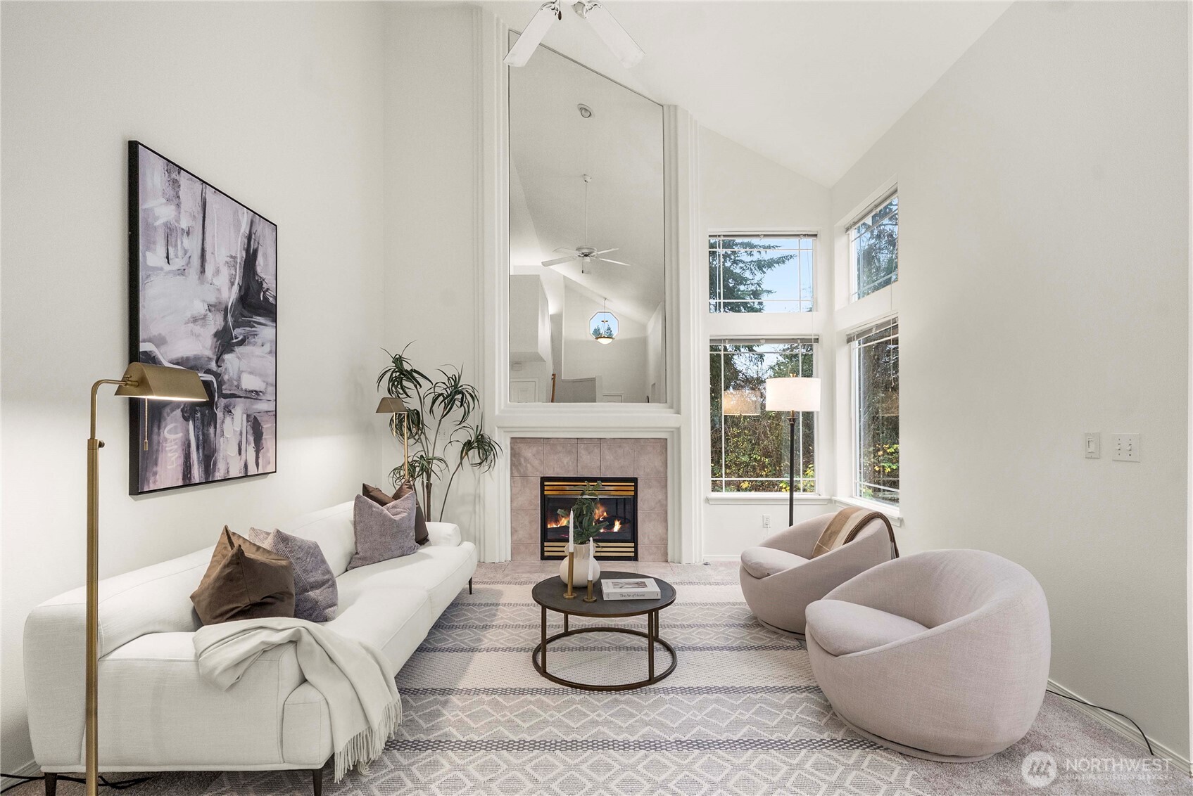 19504 Southeast 24th, Unit B Bothell, WA 98012 - Photo 2 of 34 a living room with furniture fireplace and a window