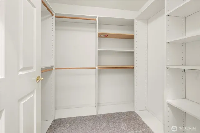 a view of an empty walk in closet
