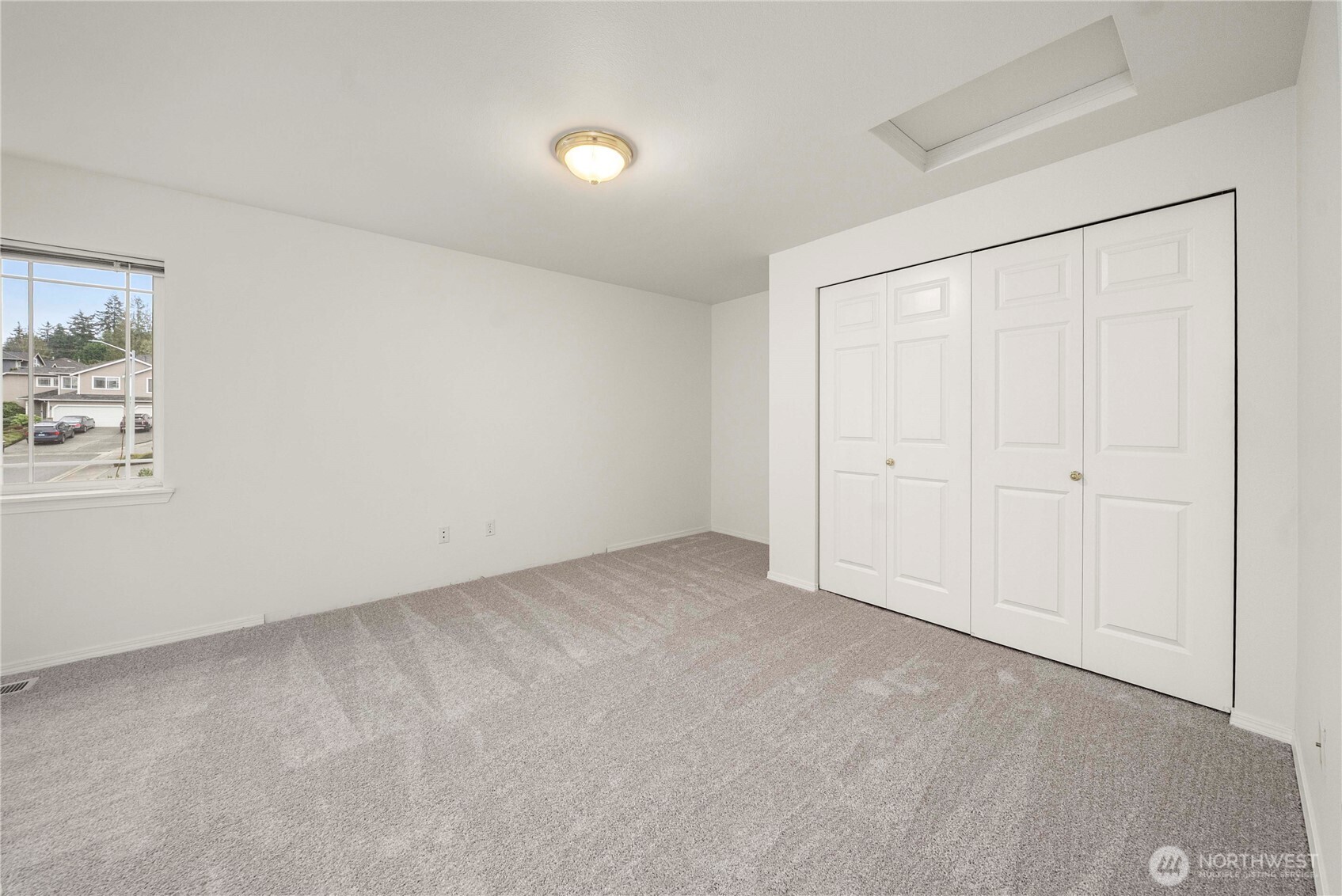 19504 Southeast 24th, Unit B Bothell, WA 98012 - Photo 25 of 34 an empty room with a empty space