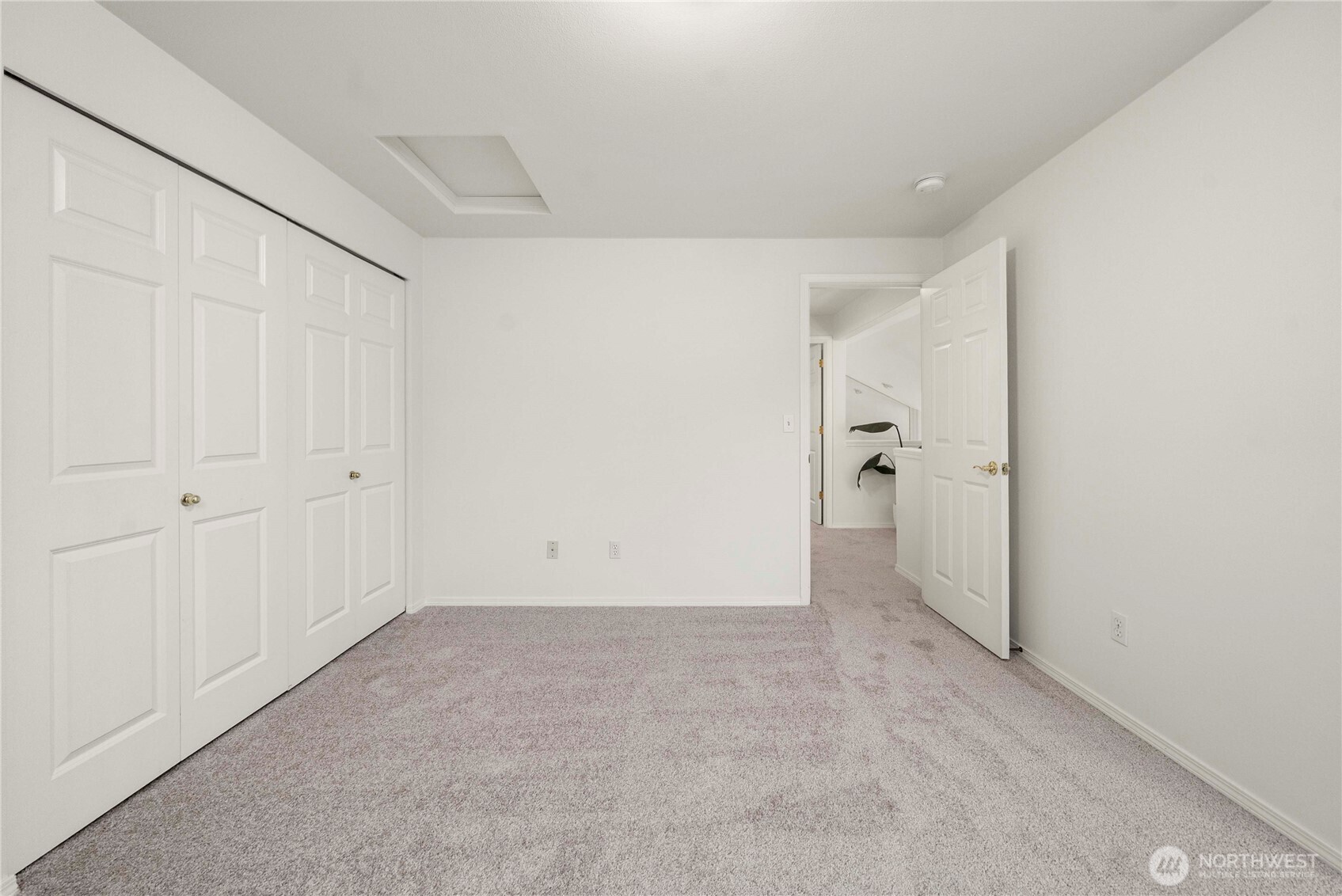19504 Southeast 24th, Unit B Bothell, WA 98012 - Photo 27 of 34 wooden floor in an empty room