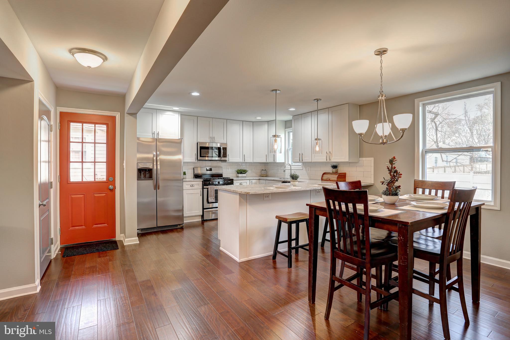 711 Cresswell Road Baltimore, MD 21225 - Photo 11 of 20 Dining room and kitchen