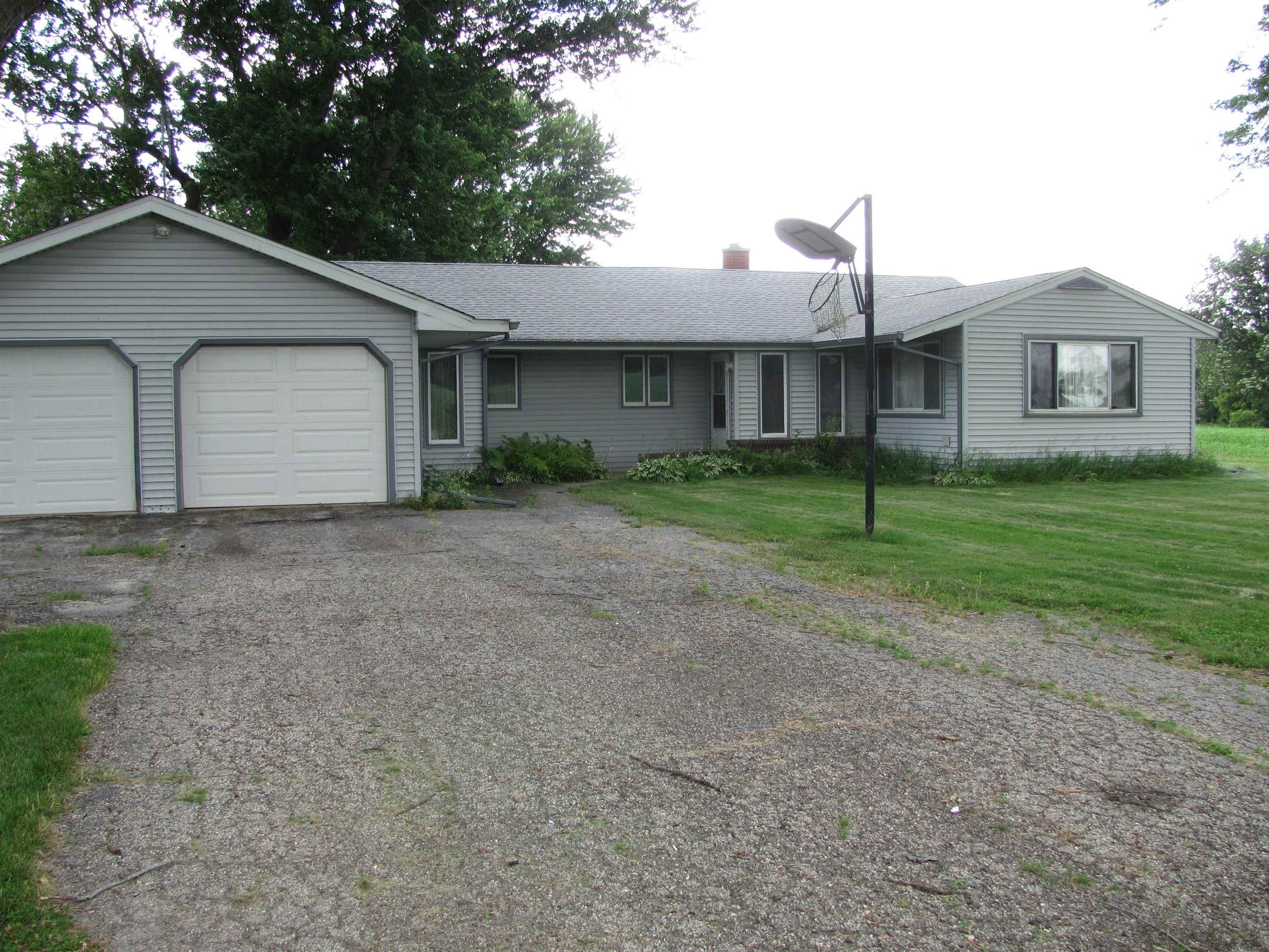 6159 Prairie Road Rockford, IL 61102 - Photo 1 of 47 a house that has a backyard of a house