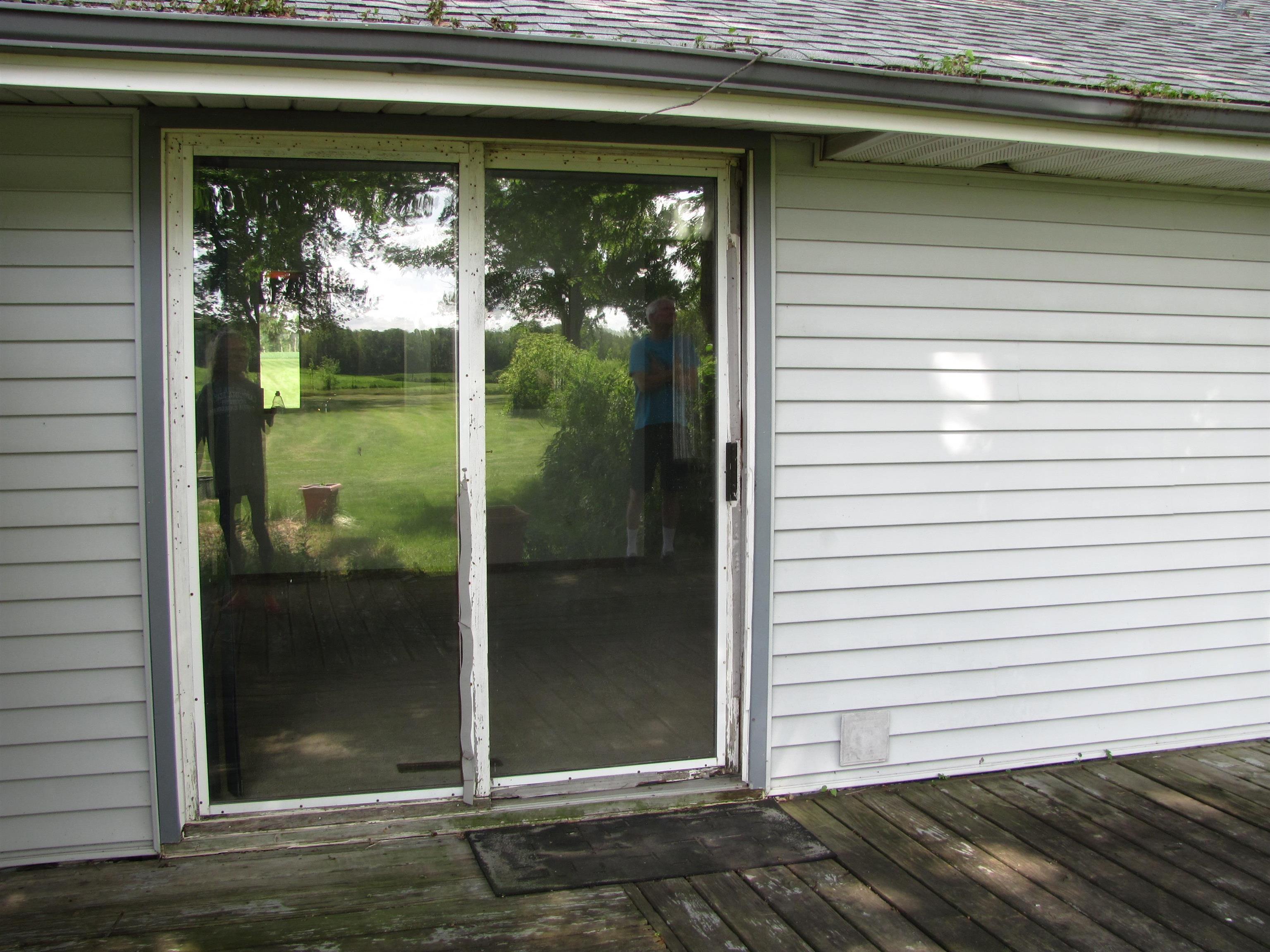 6159 Prairie Road Rockford, IL 61102 - Photo 11 of 47 a view of a door front of a house