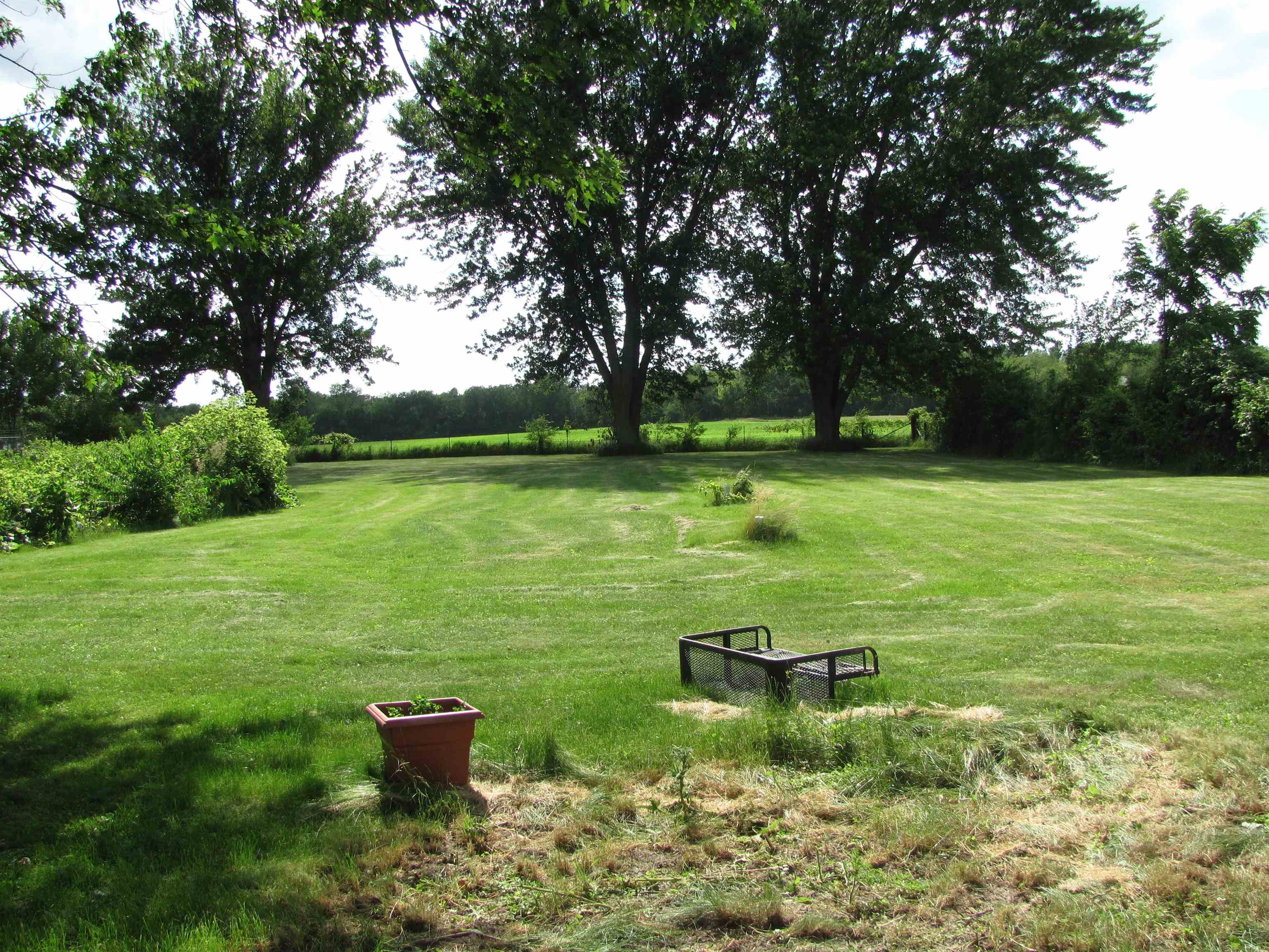 6159 Prairie Road Rockford, IL 61102 - Photo 15 of 47 a view of a swimming pool with a garden