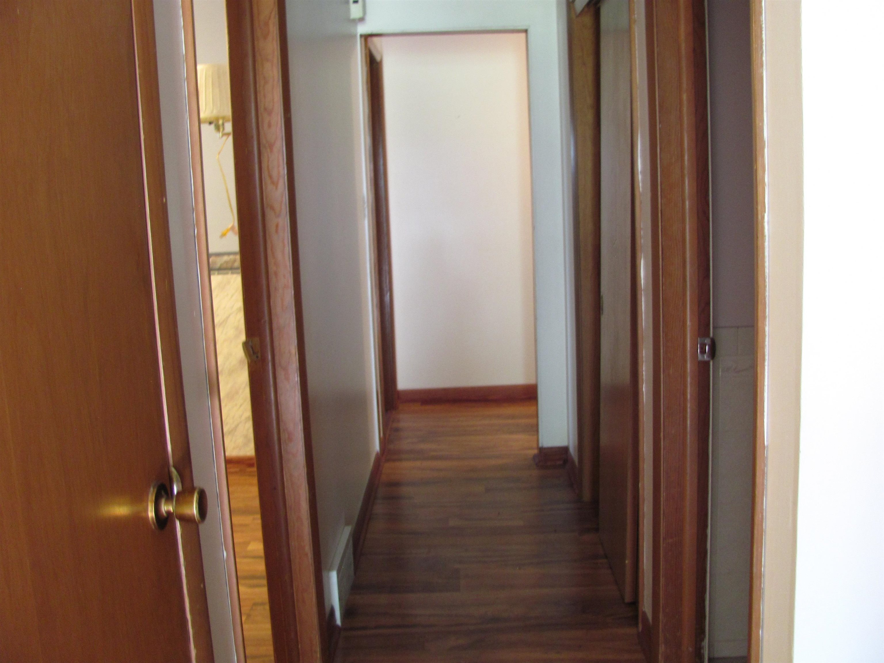 6159 Prairie Road Rockford, IL 61102 - Photo 23 of 47 a view of a bathroom from a hallway