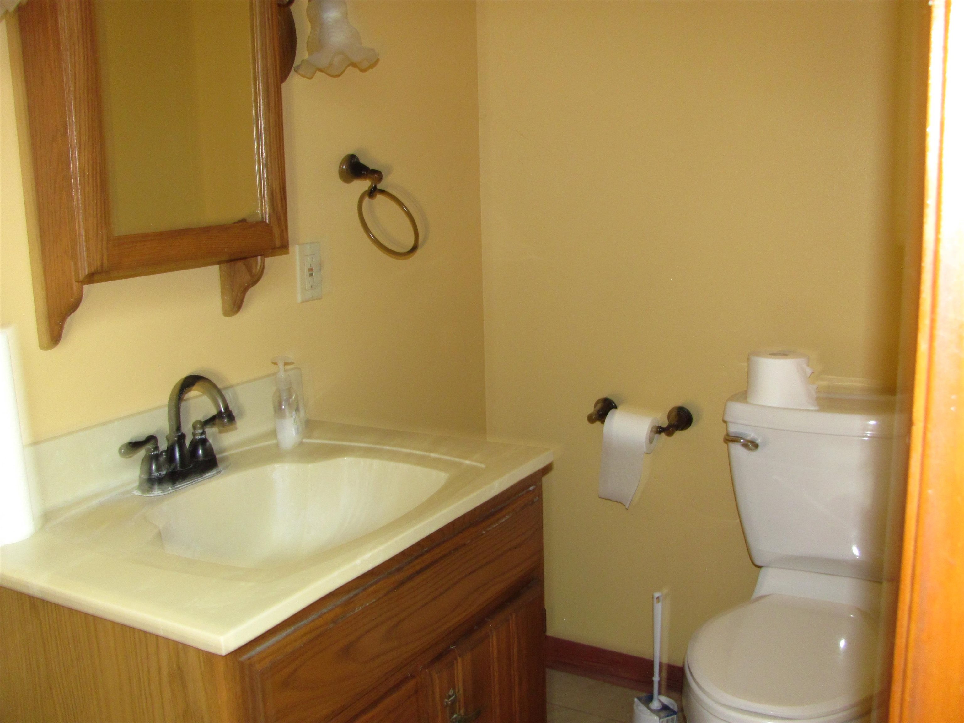 6159 Prairie Road Rockford, IL 61102 - Photo 30 of 47 a bathroom with a sink and a toilet