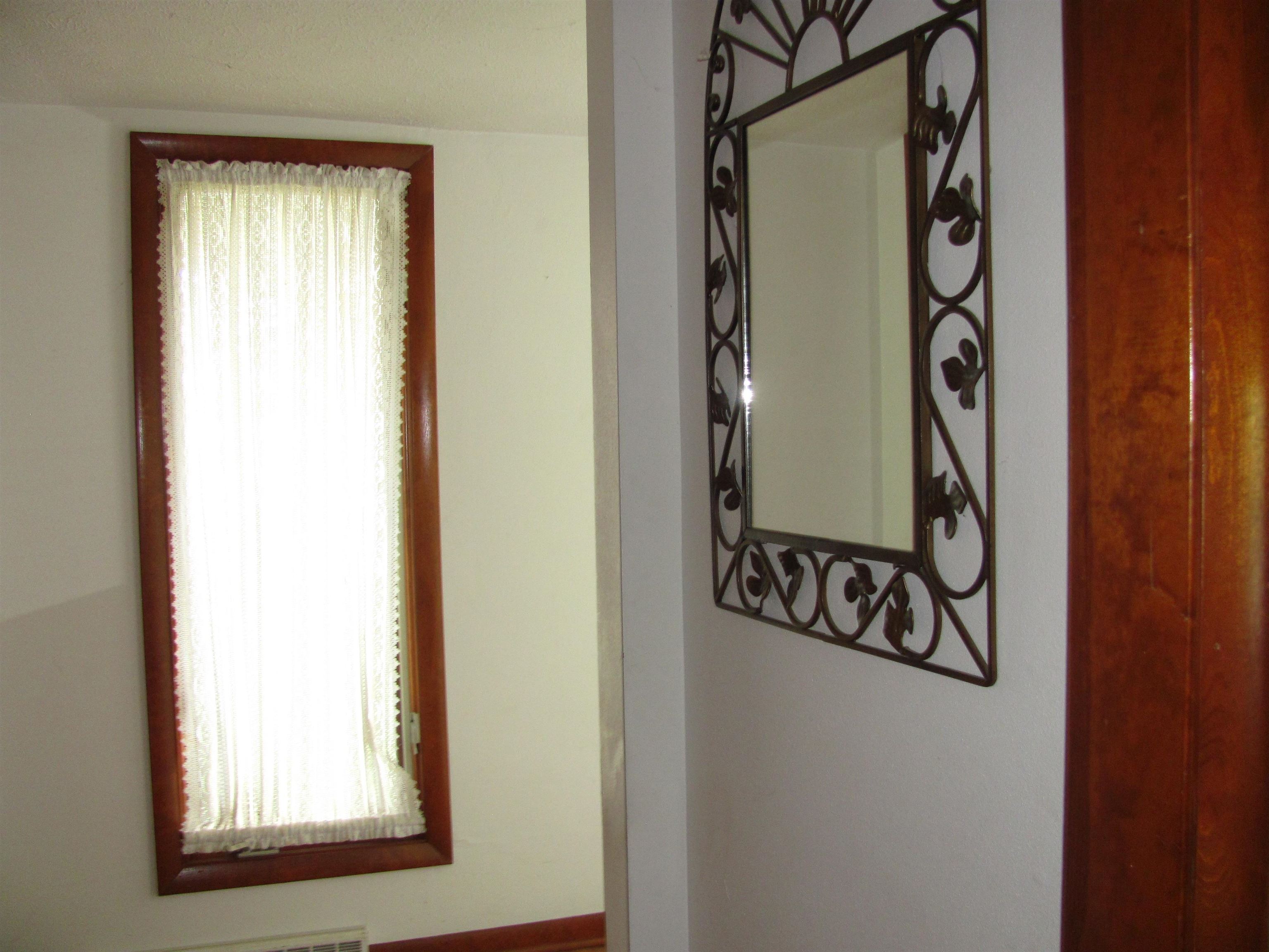 6159 Prairie Road Rockford, IL 61102 - Photo 36 of 47 a view of a door and a window in a room