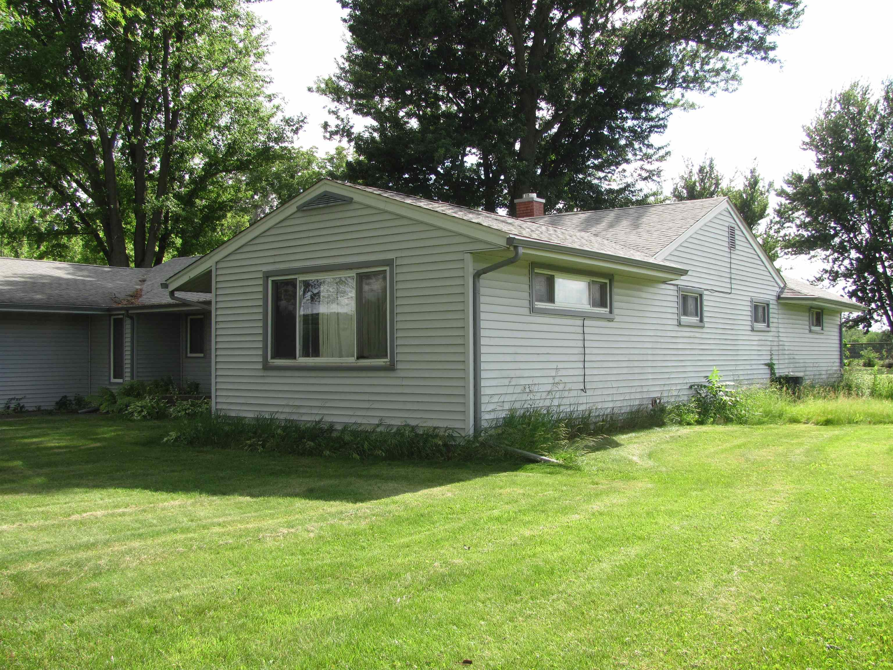 6159 Prairie Road Rockford, IL 61102 - Photo 6 of 47 a house with a outdoor space