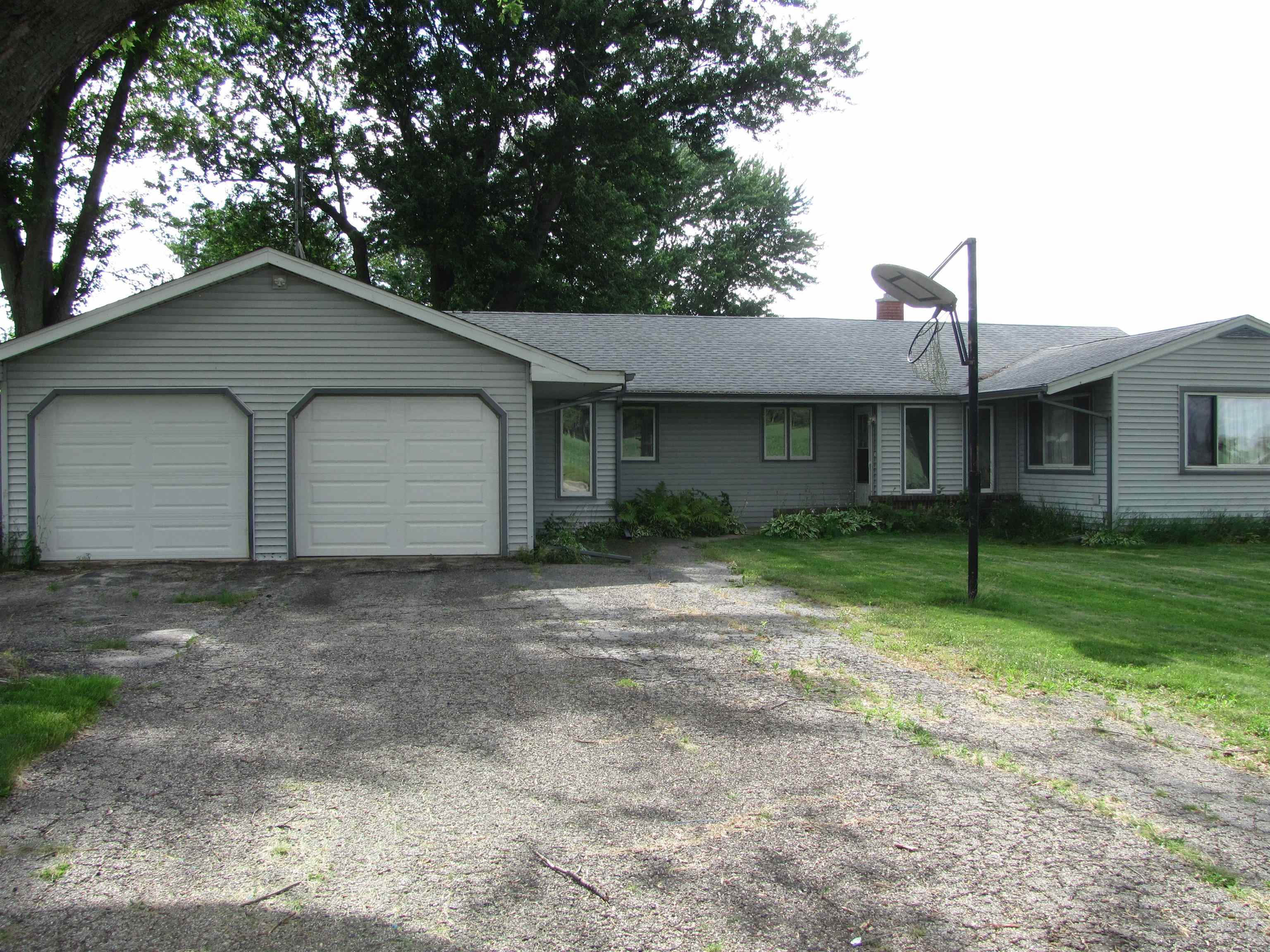 6159 Prairie Road Rockford, IL 61102 - Photo 7 of 47 a house view with a backyard space
