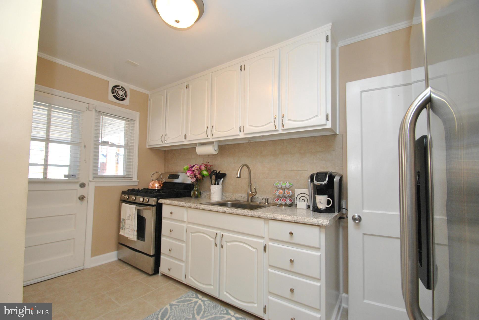 416 Stemmers Run Road Baltimore, MD 21221 - Photo 8 of 29 REMODELED KITCHEN - NEW COUNTERS