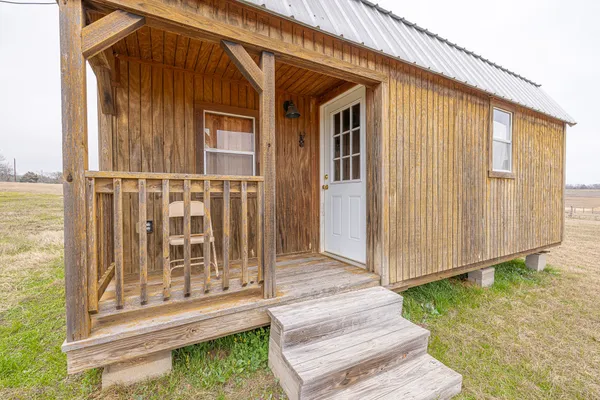 a view of backyard with deck