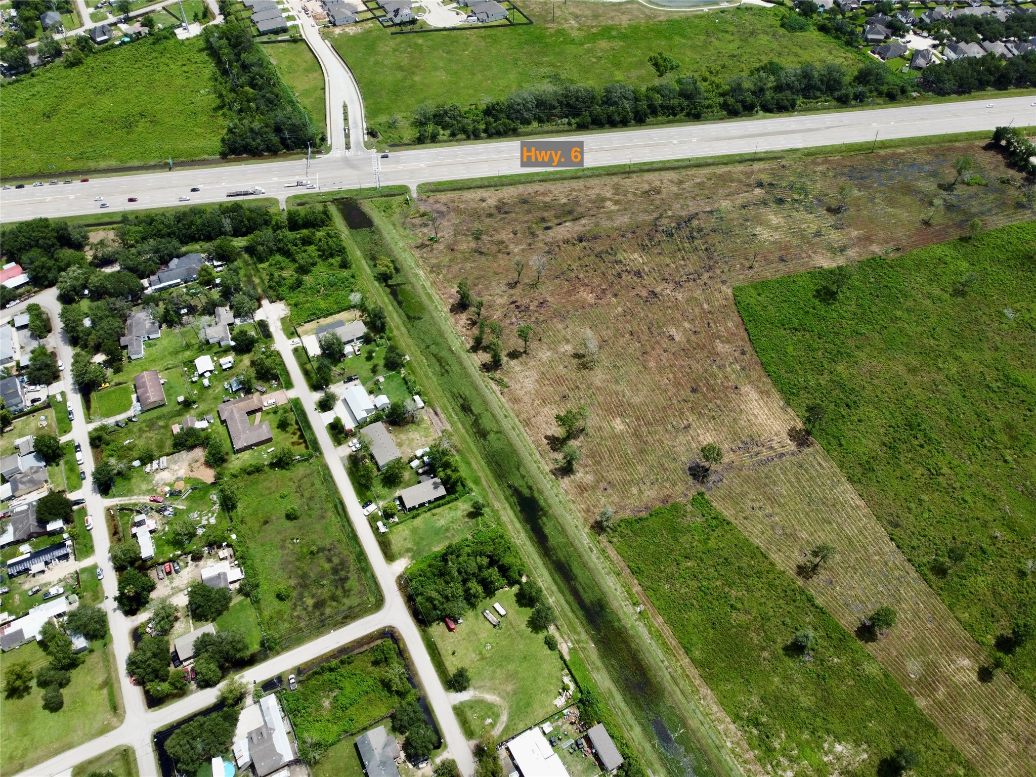 0 Judy Street Rosharon, TX 77583 - Photo 5 of 15 a view of a lush green field