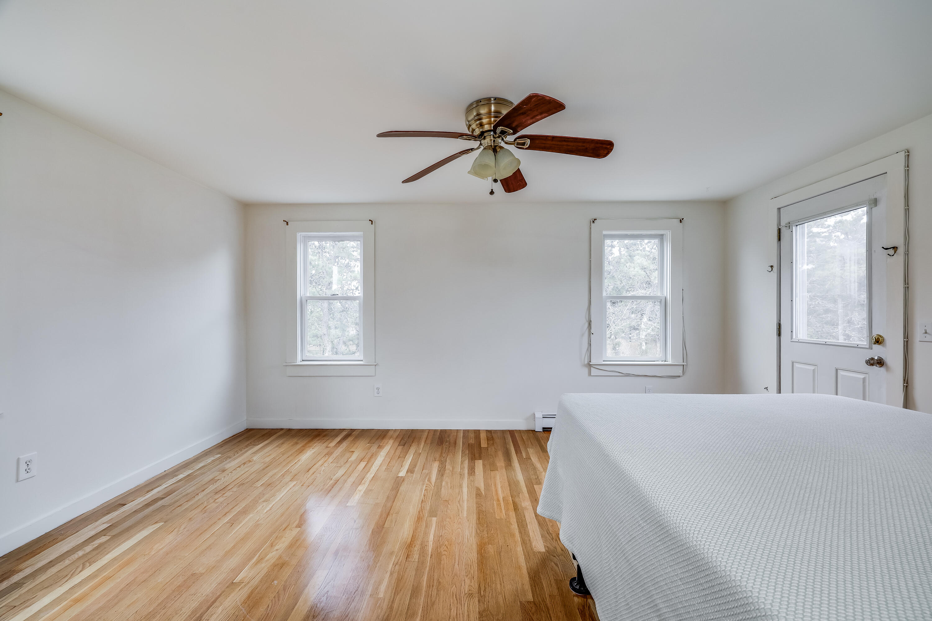 70 Shore Road Truro, MA 02666 - Photo 14 of 43 a view of room with hardwood floor and window