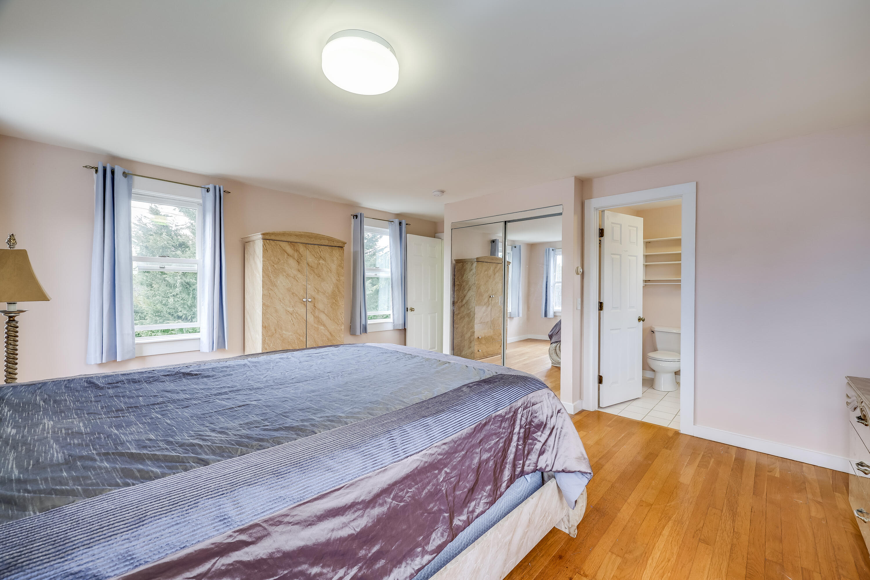 70 Shore Road Truro, MA 02666 - Photo 21 of 43 a bedroom with a bed and a window