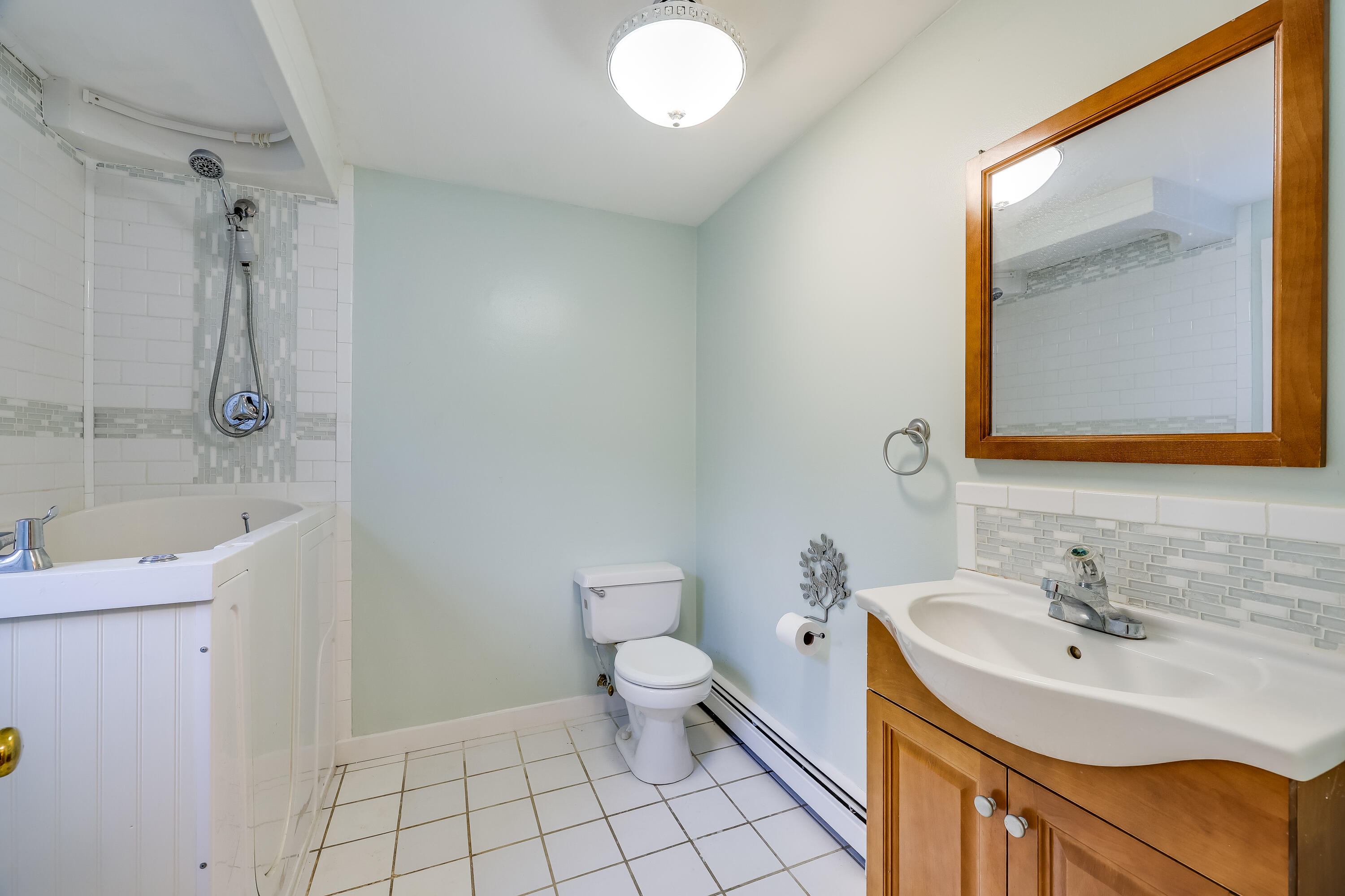 70 Shore Road Truro, MA 02666 - Photo 10 of 43 a bathroom with a sink a toilet and shower