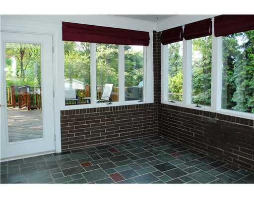 2565 Meinert Road Franklin Park, PA 15090 - Photo 7 of 18 Sunroom. The Three Season Room has walls of windows, beautiful slate floors, and offers access to the exterior deck.
