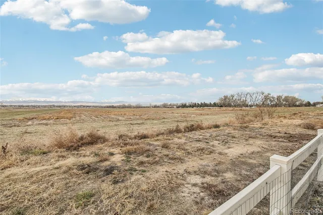 a view of a lake next to a building